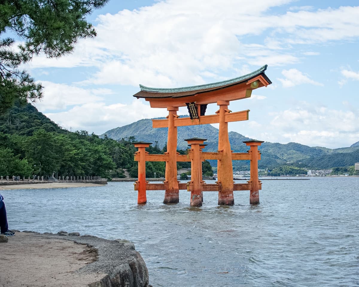 The floating torii gate of Itsukushima Shrine near Hiroshima at sunset
