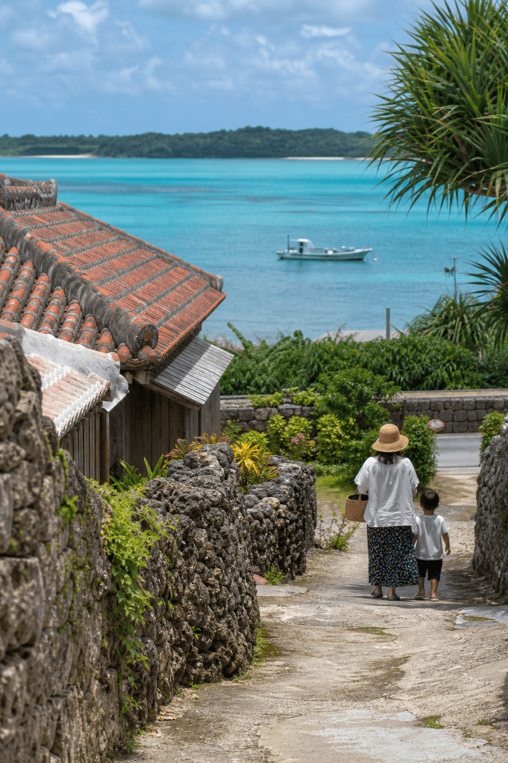 Turquoise water along an Okinawa shore with island village stone walls and warm subtropical light