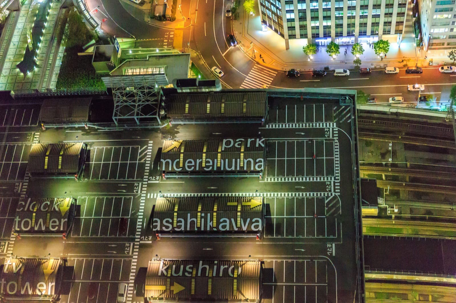 An aerial night view of JR Sapporo Station and the illuminated station-front district — Hokkaido's northern gateway hub.